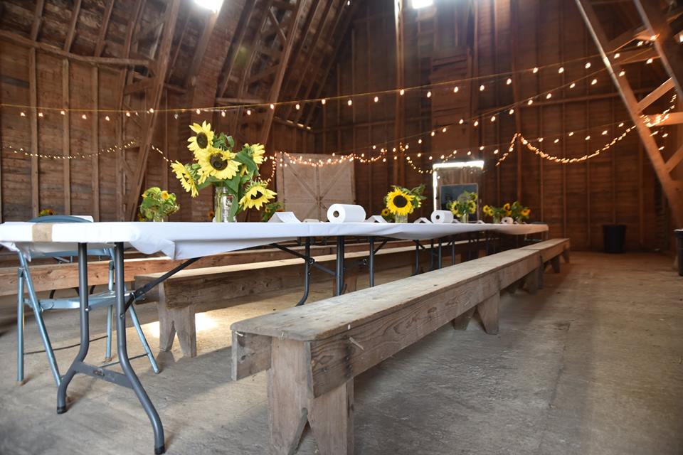 Table decorated for All in the Barn fundraiser